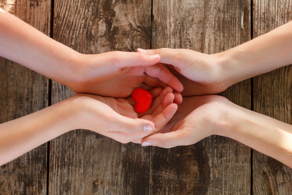 Large Vecteezy Small Red Heart Lies In The Hands Of Men And Women The 13179683 Large 1