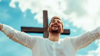 Large Vecteezy A Man With His Arms Up In Front Of A Cross 57306363 Large