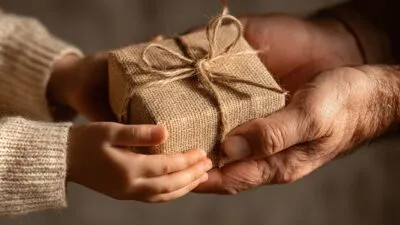 Large Vecteezy Gift Exchange Between A Child And An Elder During A Warm 74236469 Large